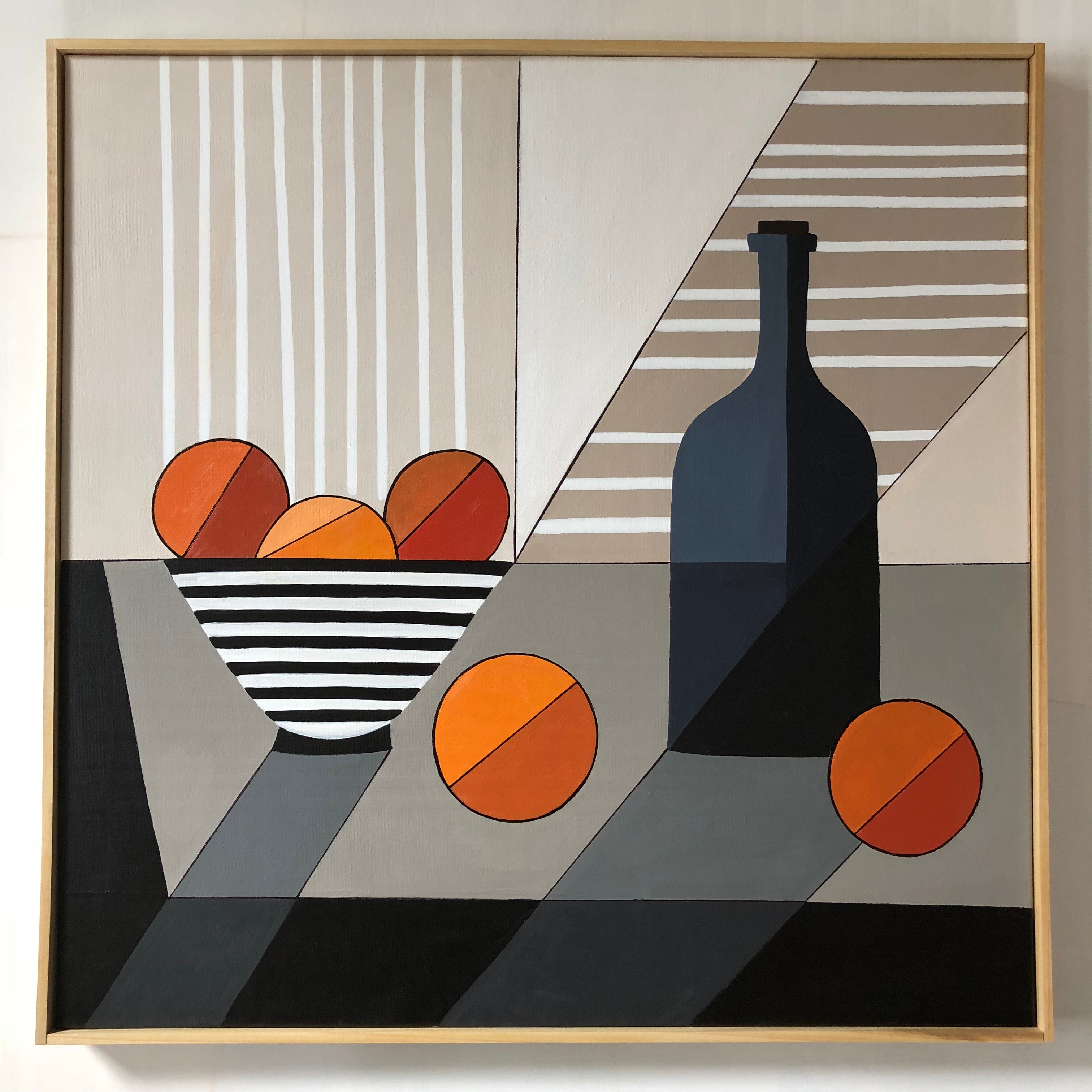 Bowl of Oranges With Blue Bottle